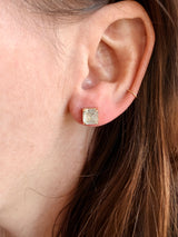 Close-up of an ear with Tura Sugden’s Rose Cut Diamond Earrings - Asscher in recycled 18k gold.