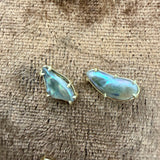 Abalone Pearl Earrings by Tura Sugden: Irregular pearls & 18k gold prongs on brown fabric.