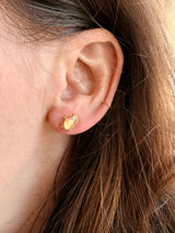 Ear close-up with Tura Sugden Pink Spinel Earrings and a small gold hoop in the upper ear.